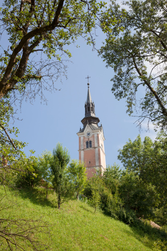 St josef's church Kranj Slovenia in summer - viewed from banks of Kokra river