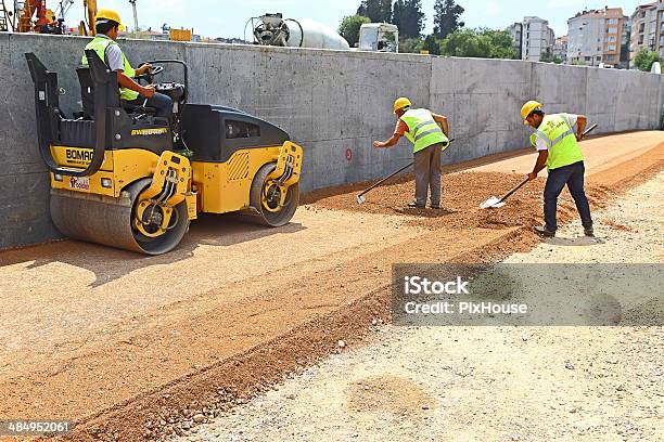 Road Roller At Work Stock Photo - Download Image Now - Asphalt, Asphalt Paving Machine, Building - Activity