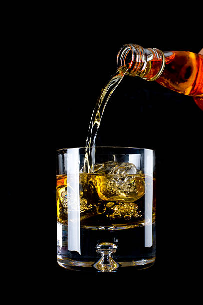 istock Whiskey being poured into a glass 484952141