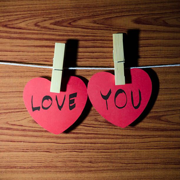 istock red heart on wood background 484952539
