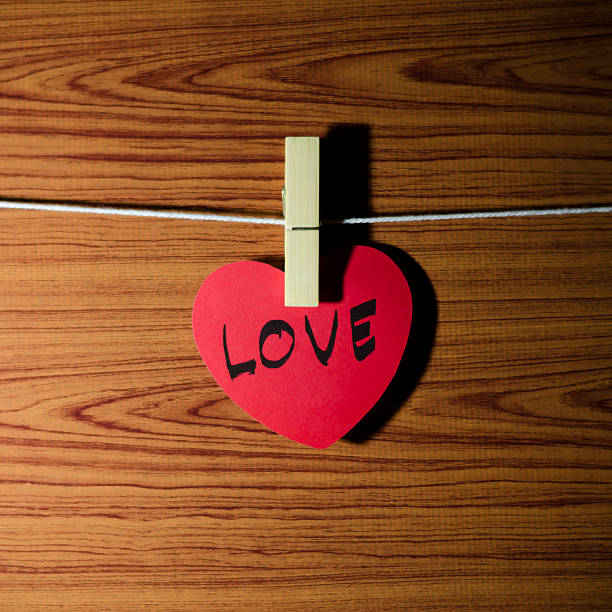 istock red heart on wood background 484952541