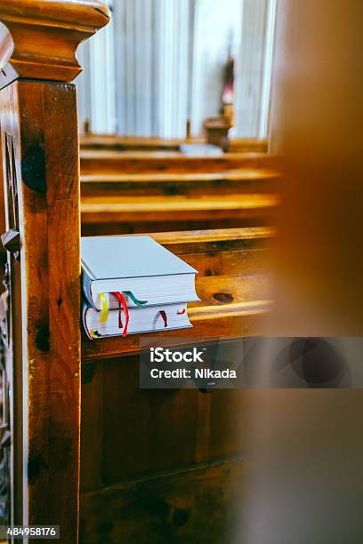 Books In A Church Stock Photo - Download Image Now - 2015, Bench, Bible