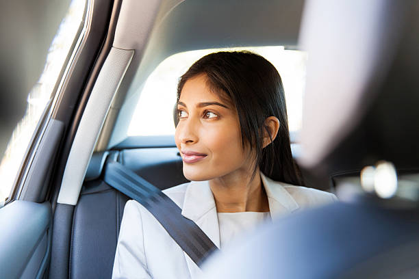 istock indian business executive looking out of a car window 484958502