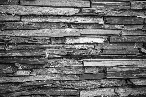 layer of black and white stone wall as background