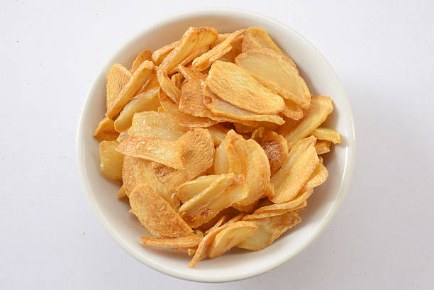 istock Garlic, sliced and fried in oil. 484964970