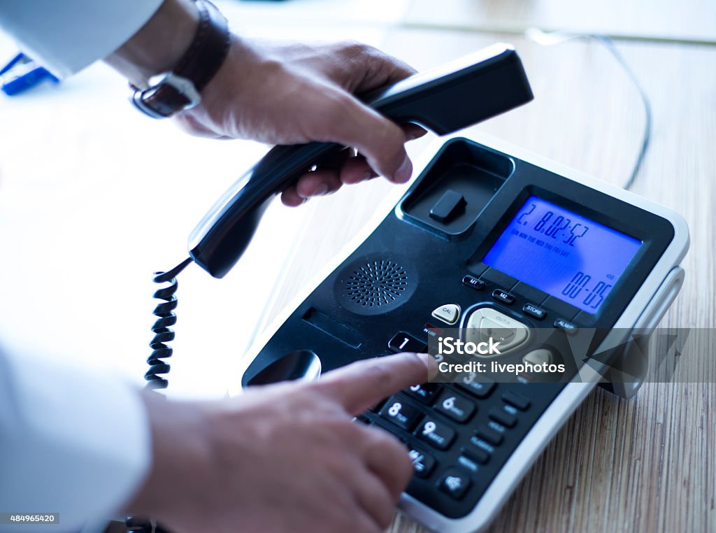 Dialing telephone keypad ,Making a call Endorsing Stock Photo