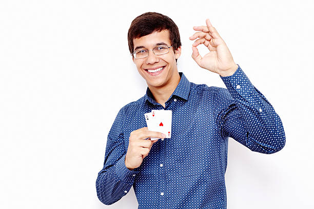 istock Guy with cards and okay sign 484965972