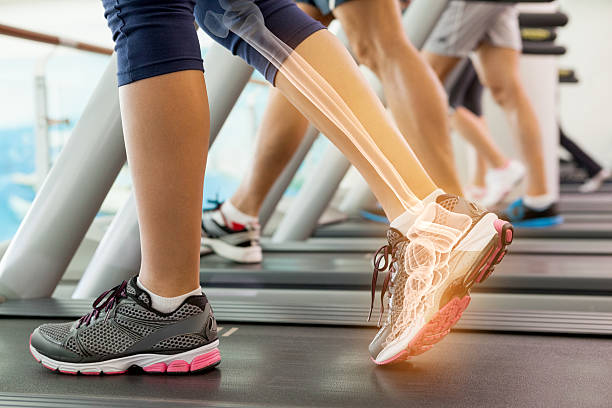 istock Highlighted ankle of woman on treadmill 484968472