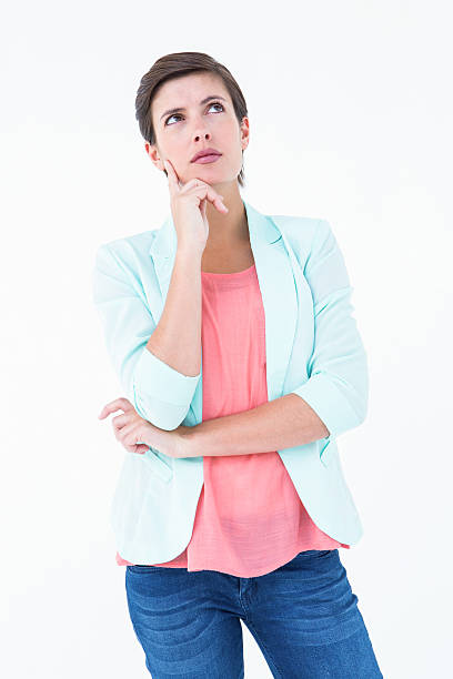 istock Thoughtful brunette with finger on cheek 484968666