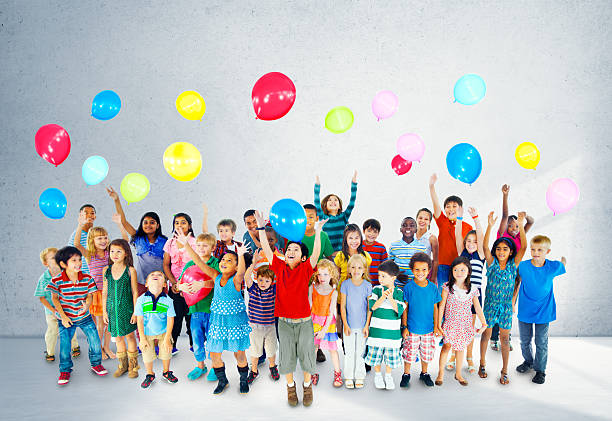 istock Multiethnic Children Smiling Happiness Friendship Balloon Concep 484969028