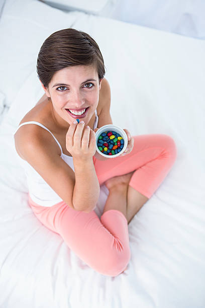 istock Beautiful woman eating sweet 484971914