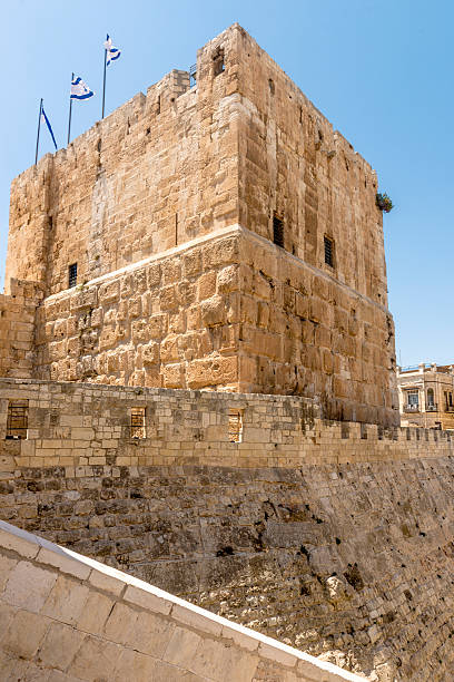 istock ancient city walls and towers in  old Jerusalem 484980374