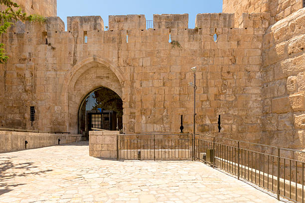 istock ancient city walls and towers in  old Jerusalem 484980376
