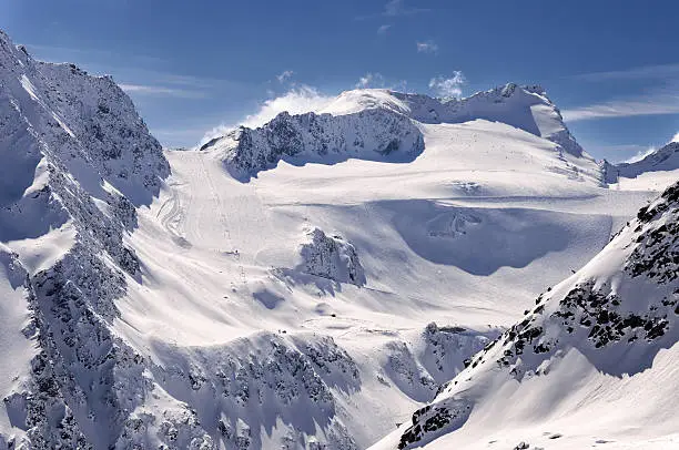 Ski pistes and lifts on Glacier in Solden ski resort in Otztal Alps in Tirol, Austria