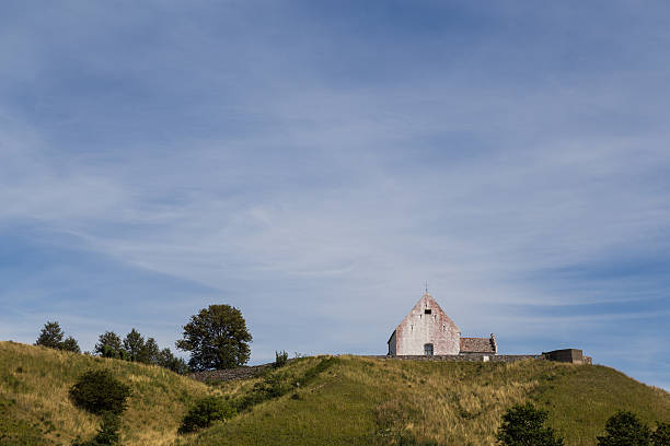 Photograph of a small church on a hill on the Swedish island Ven.