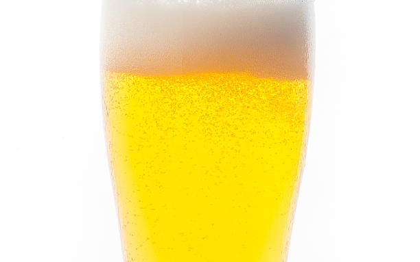 istock Closeup isolated single glass of beer with bubble 484983454