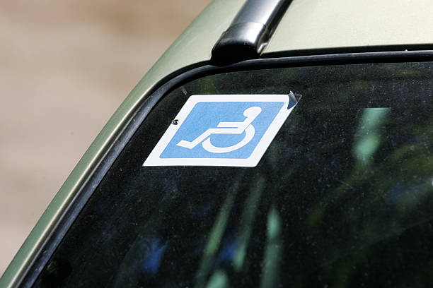 istock Disabled sign on the car glass 484989530