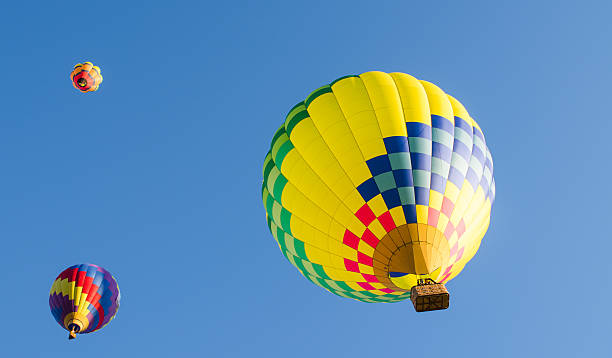 istock Colorful hot air balloon flying in the blue sky 484989638