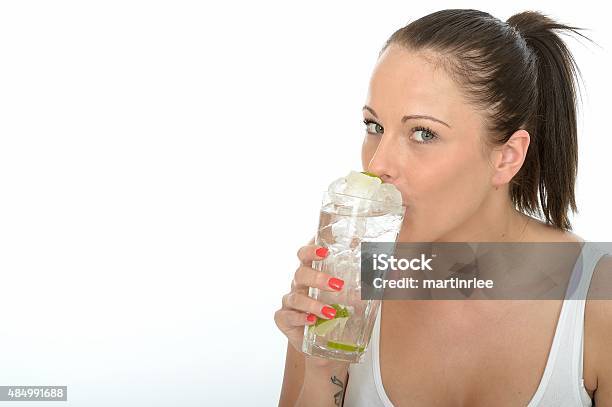 Young Woman Holding A Glass Of Iced Water With Ice Stock Photo - Download Image Now - Drinking, Holding, Ice Cube