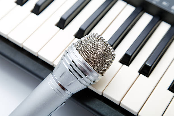 istock The microphone lies on synthesizer keyboard 484992126
