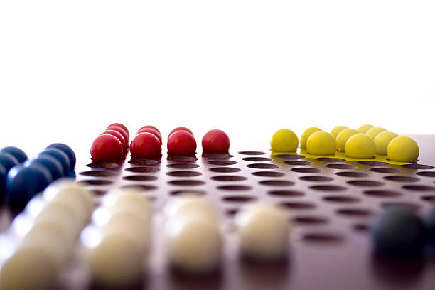 Chinese Checkers Closeup of Chinese Checkers marbles. chinese checkers stock pictures, royalty-free photos & images