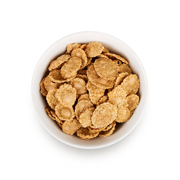 istock Multigrain flakes in small white plate, isolated 485006450