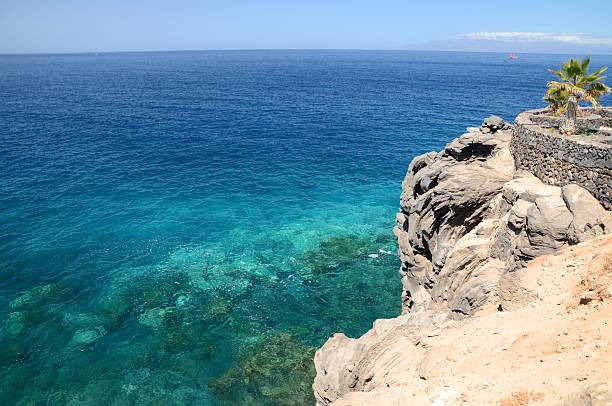 istock Turquoise bay and volcanic cliffs in Callao Salvaje, Tenerife, Spain 485007622