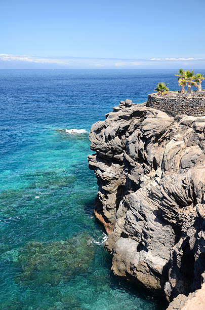 istock Turquoise bay and volcanic cliffs in Callao Salvaje, Tenerife, Spain 485007632