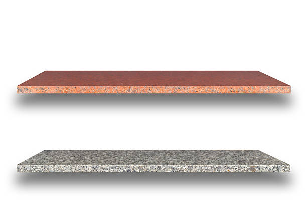 istock Empty top of natural stone shelves isolated on white background 485007668