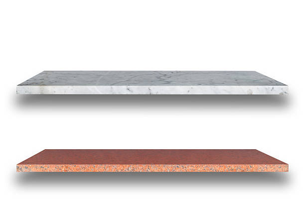 istock Empty top of natural stone shelves isolated on white background 485007670