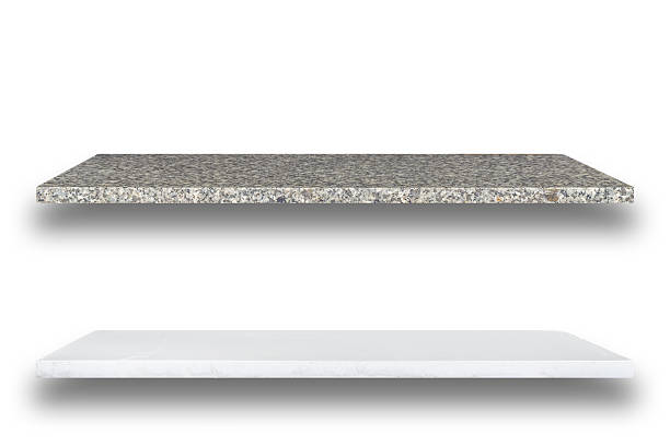 istock Empty top of natural stone shelves isolated on white background 485007680