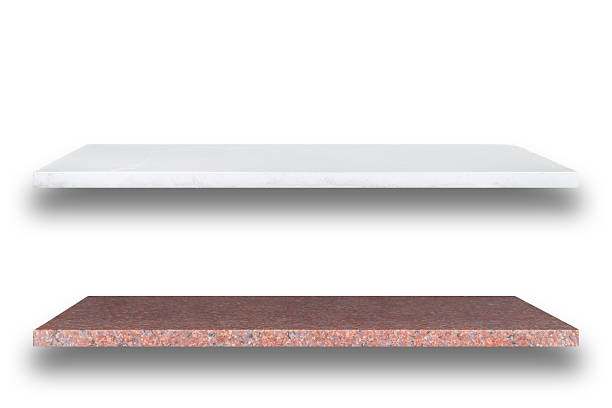 istock Empty top of natural stone shelves isolated on white background 485007690