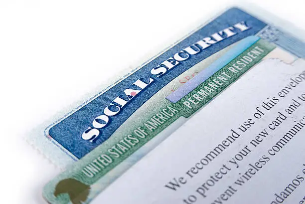United States of America social security and green card on white background