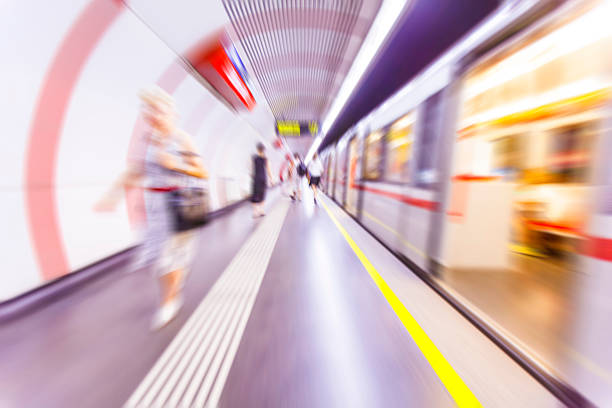 istock Motion blurred people walking in subway station. 485010468