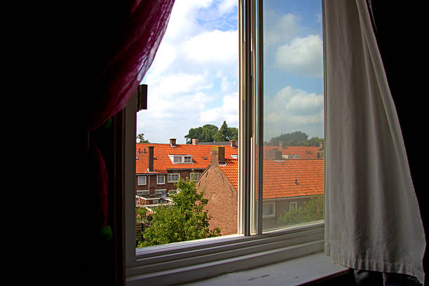 istock through the window watching the houses 485010918