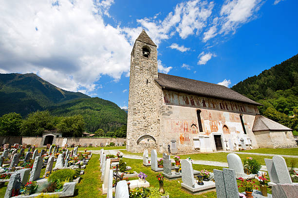 Gufidaun / Gudon - Italy / June 2018: The old cemetery with iron crosses of Parrocchia Gudon located in the South Tyrolean hills of Italy.
