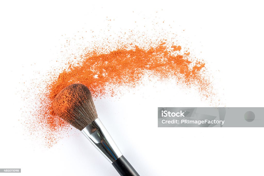 orange Powder Eyeshadow on a Brush, fashion beauty orange Powder Eyeshadow on a Brush, fashion beauty  tool blusher Make-Up Stock Photo