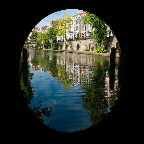View under bridge of Oudegracht canal in Utrecht in the Netherlands