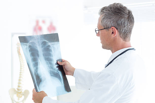istock Thoughtful doctor holding xray 485011538