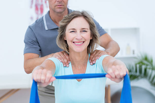 istock Doctor examining his patient back 485012970