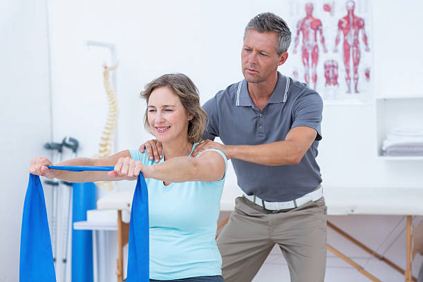 istock Doctor examining his patient back 485012978