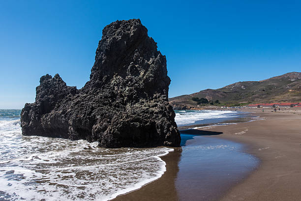 istock Rodeo Beach California rocks waves and sand 485016866