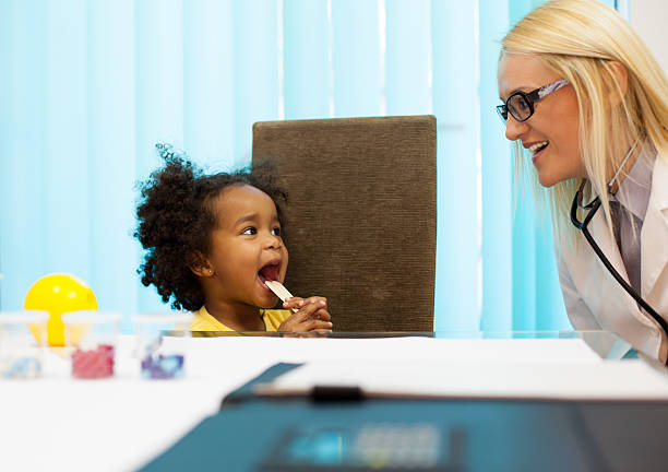 istock Little girl with doctor 485017285