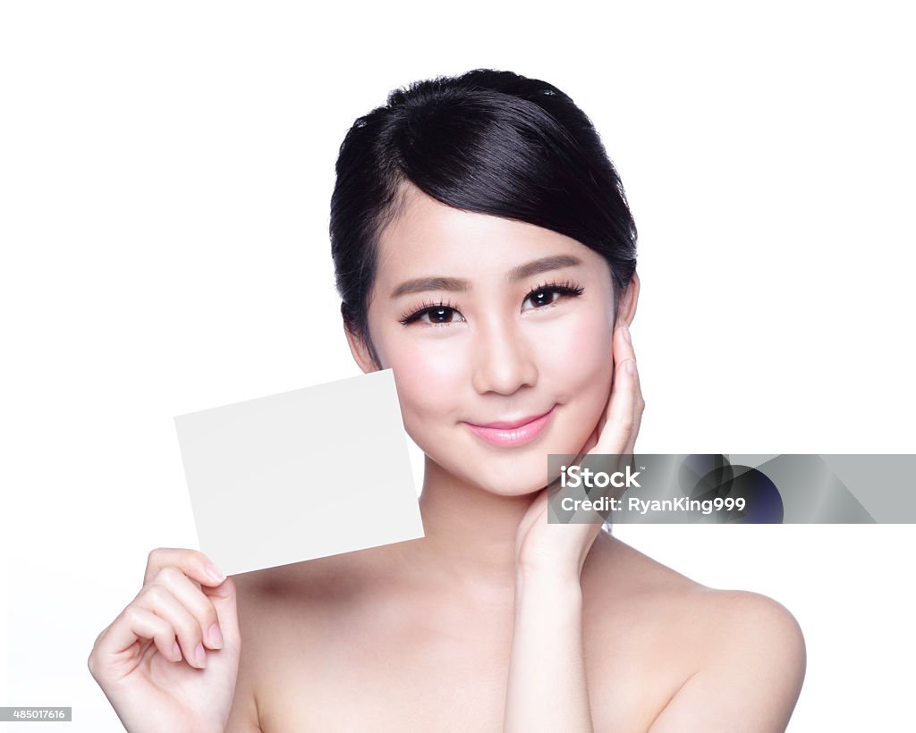 Beauty Skin care woman showing Beauty Skin care woman showing white billboard (empty Copy space), with clean face skin, concept for skin care, asian 2015 Stock Photo