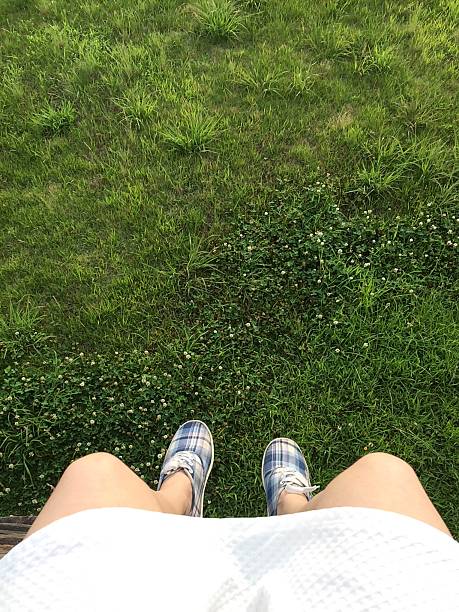 Japanese girl take selfie in spring. This is taken in a park Tachikawa, Japan, in May. The girl is 20-30 years old.