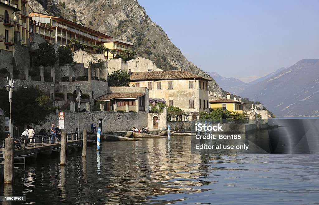 Lemon on Garda Limone sul Garda, Italy - April 6, 2014: Limone sul Garda in the italian Region Lombardy at Lake Garda. It is located at the western shore of the Lake and is a popular place for tourists and local people. Coastline Stock Photo