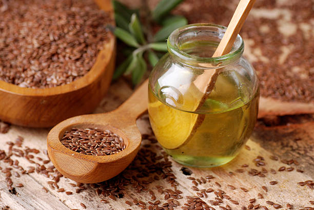olio essenziale linseed - fish oil vitamin e cod liver oil nutritional supplement foto e immagini stock
