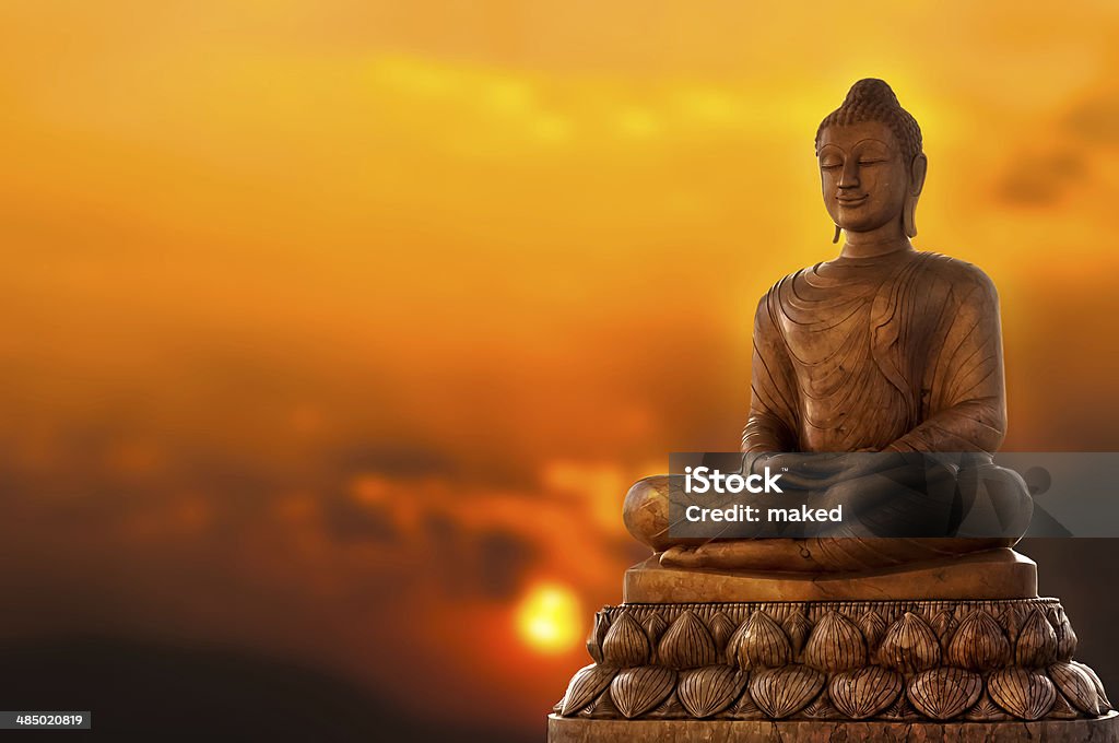 Buddha Statue Buddha Statue and sunset background Buddha Stock Photo