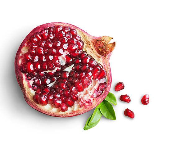 pomegranate fruit Juicy pomegranate fruit isolated on white background pomegranate stock pictures, royalty-free photos & images