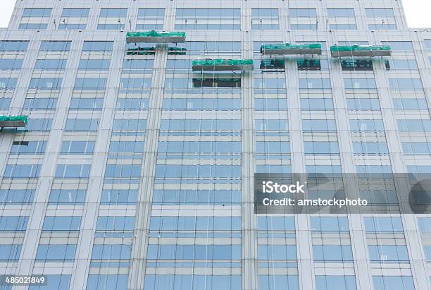 Worker Cleaning Windows Stock Photo - Download Image Now - Adult, Blue, Blue-collar Worker